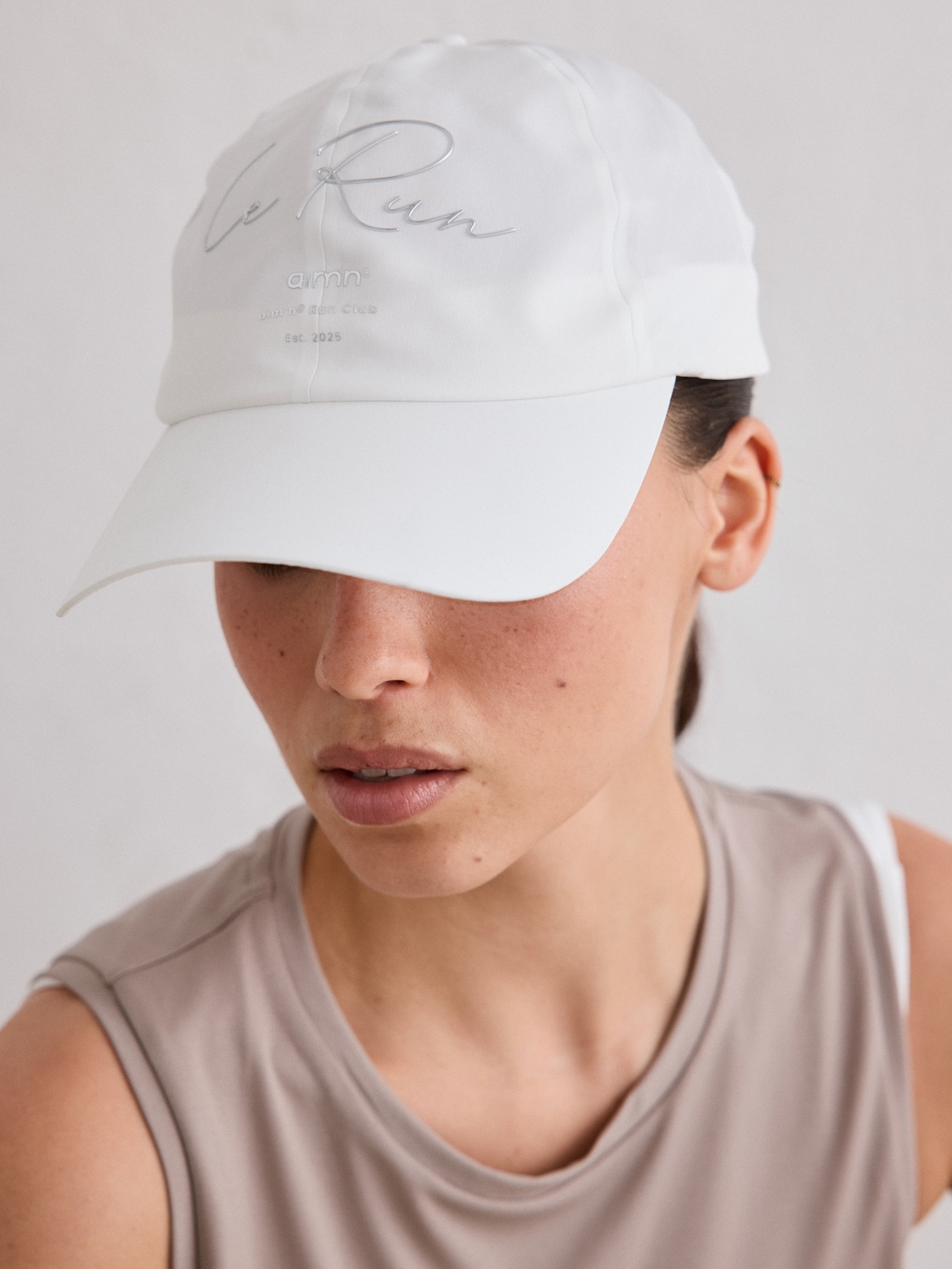 
AIM&acute;N, 
LE RUN RUNNING CAP, 
Detail 1
