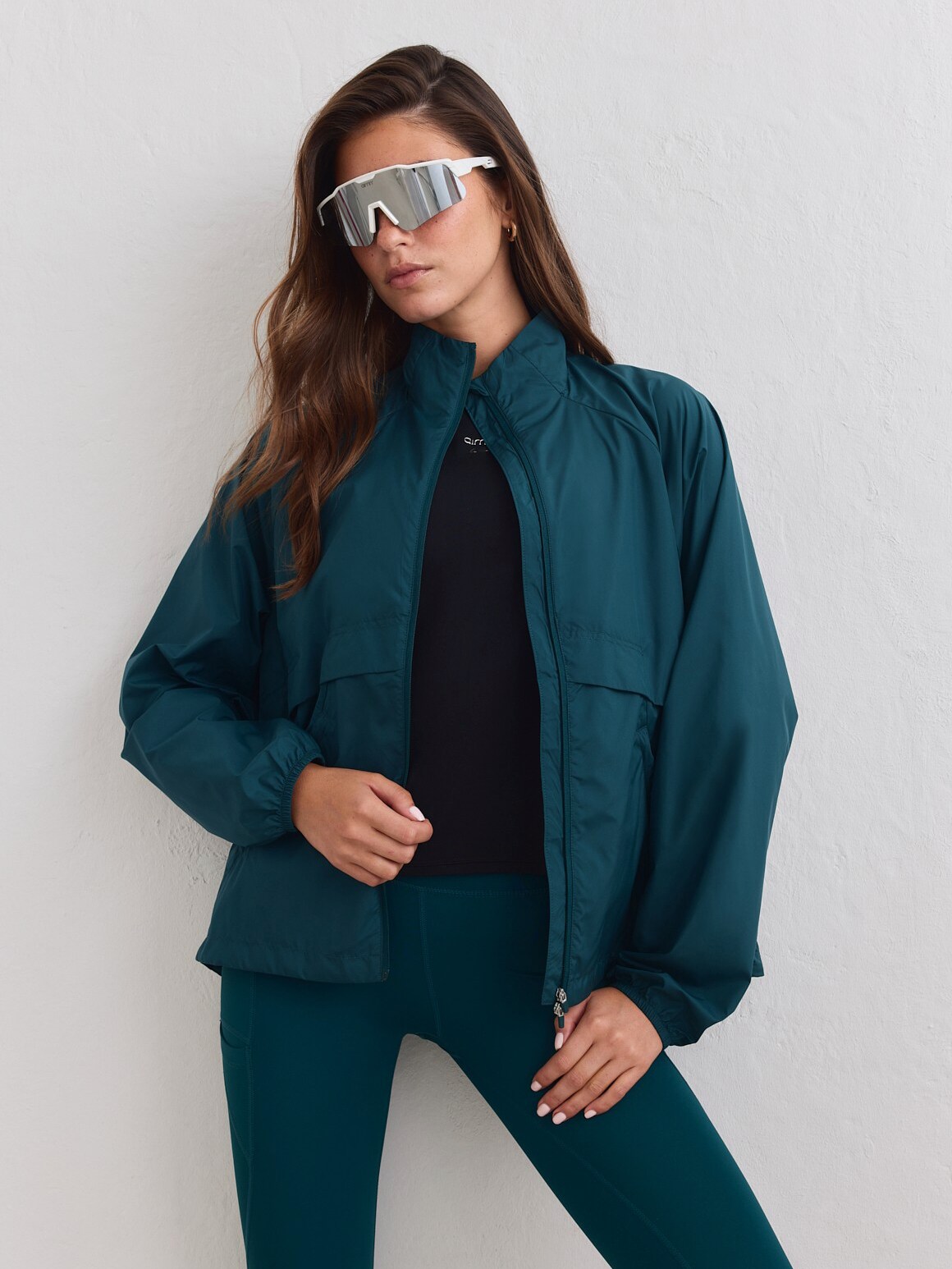 
AIM&acute;N, 
W RUNNING JACKET, 
Detail 1
