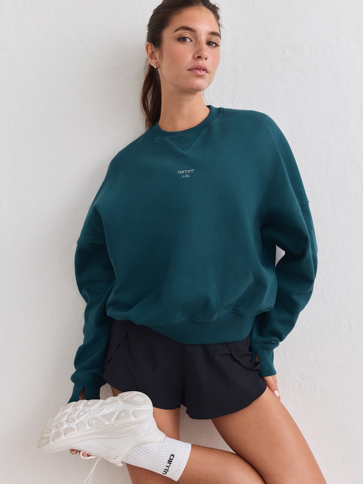 
AIM&acute;N, 
W LE RUN RUNNING SWEATSHIRT, 
Detail 1

