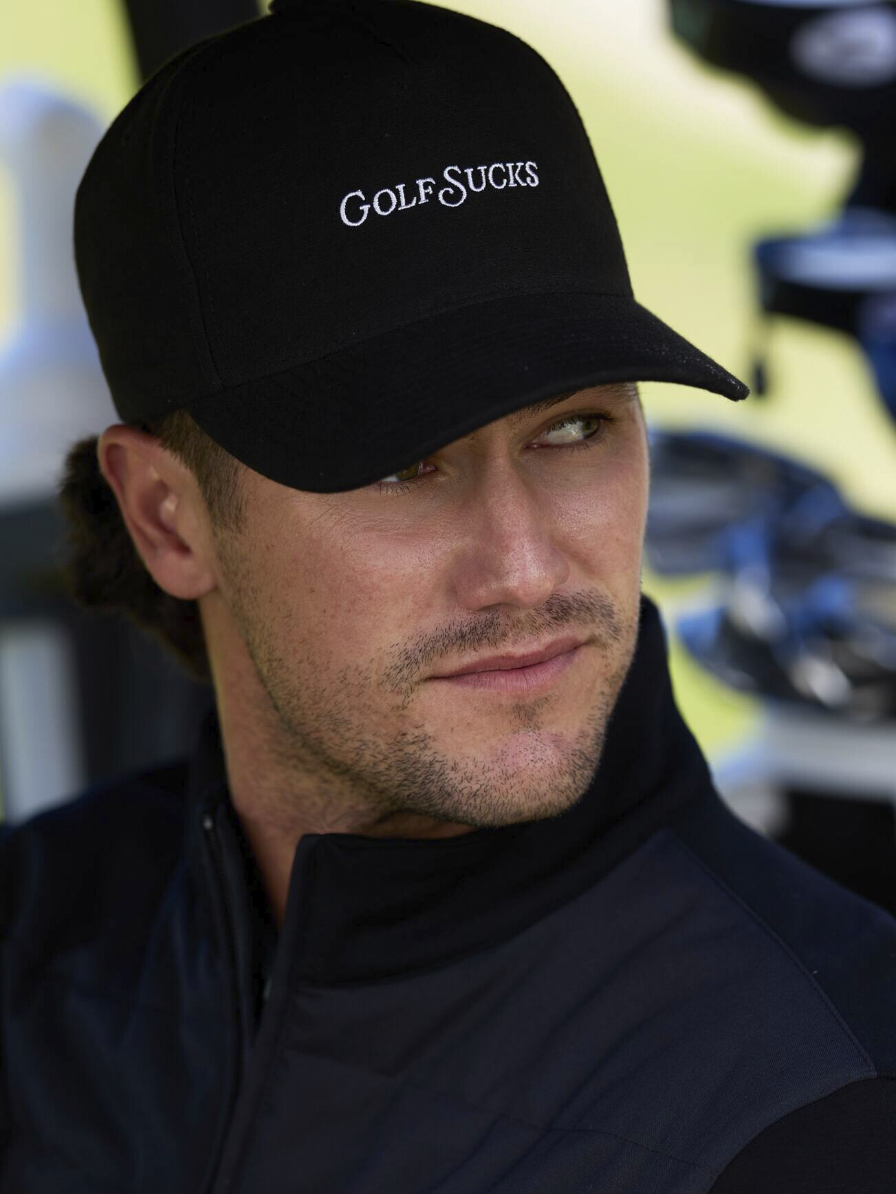 
TRAVISMATHEW, 
GOLF SUCKS HAT, 
Detail 1
