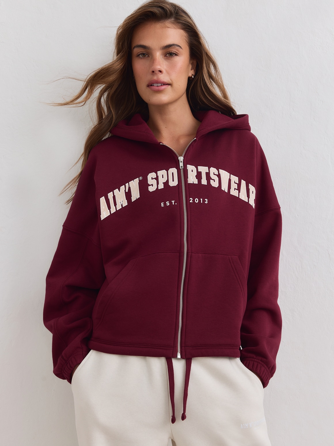
AIM&acute;N, 
W VARSITY SWEAT ZIP HOOD, 
Detail 1
