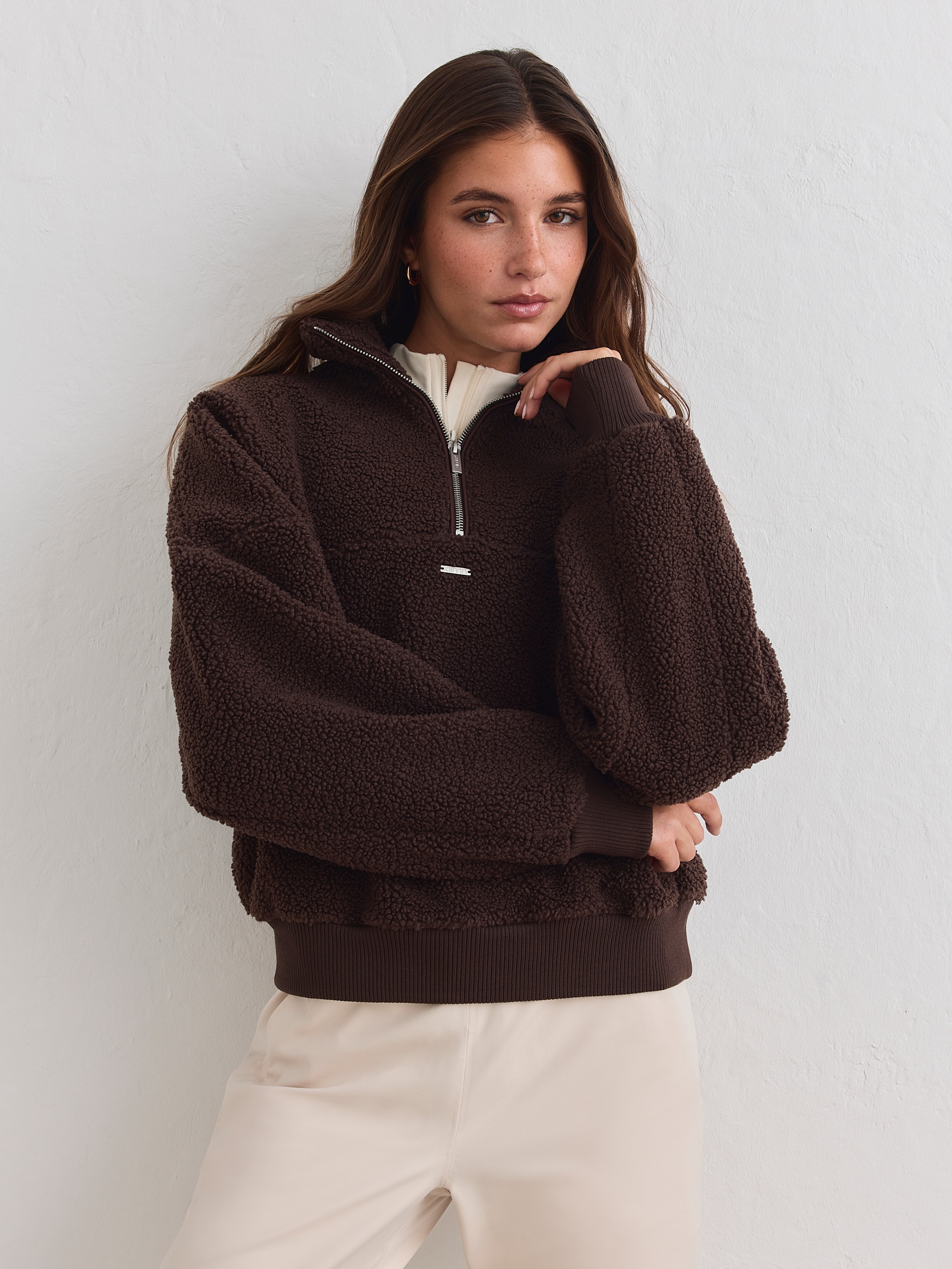 
AIM&acute;N, 
PILE HALF ZIP, 
Detail 1
