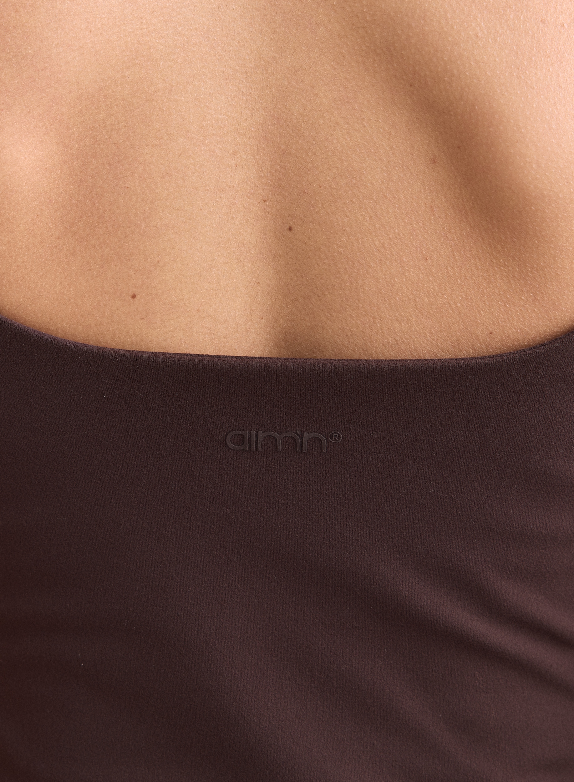 AIM&acute;N, SENSE SINGLET